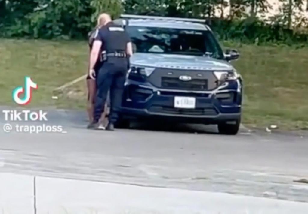 PGPD investigates viral video showing uniformed officer kissing woman at park near school.