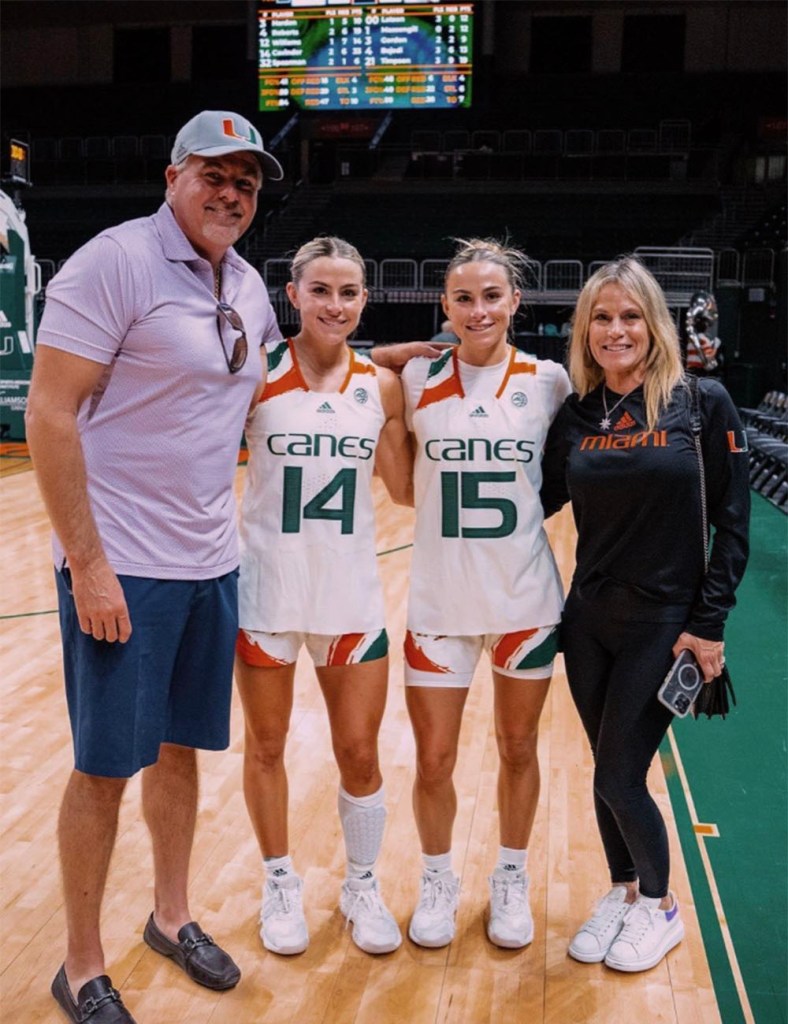 Haley and Hanna Cavinder with their parents during Miami’s March Madness run in 2023.