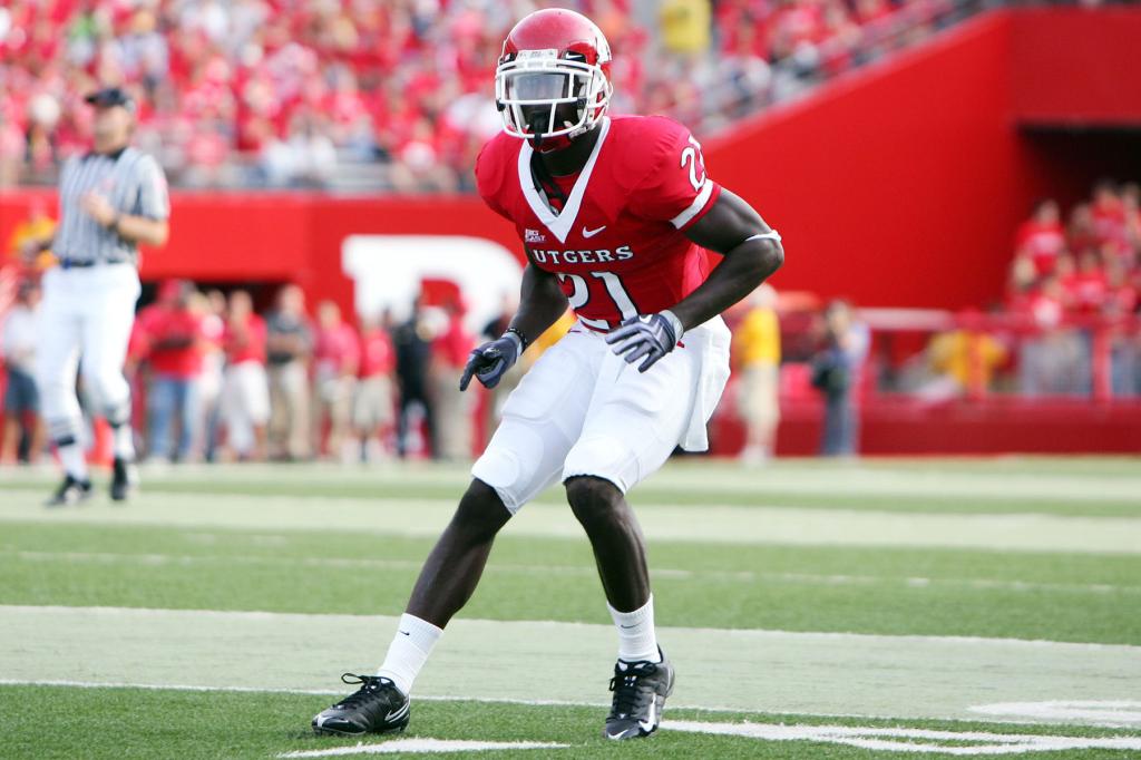 Cornerback Devin McCourty #21 of the Rutgers University Scarlett Knights defends against the University of Cincinnati Bearcats on September 7, 2009 at Rutgers Stadium in Piscataway, New Jersey. Cincinnati won 47-15.  