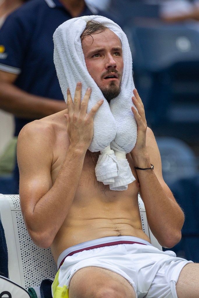 Daniil Medvedev of Russia cools off with an ice pack between sets two and three during his match against Andrey Rublev of Russia in the Men's Singles Quarter-Finals match on Arthur Ashe Stadium during the US Open Tennis Championship 2023 at the USTA National Tennis Centre on September 6, 2023 in Flushing, Queens, New York City.  