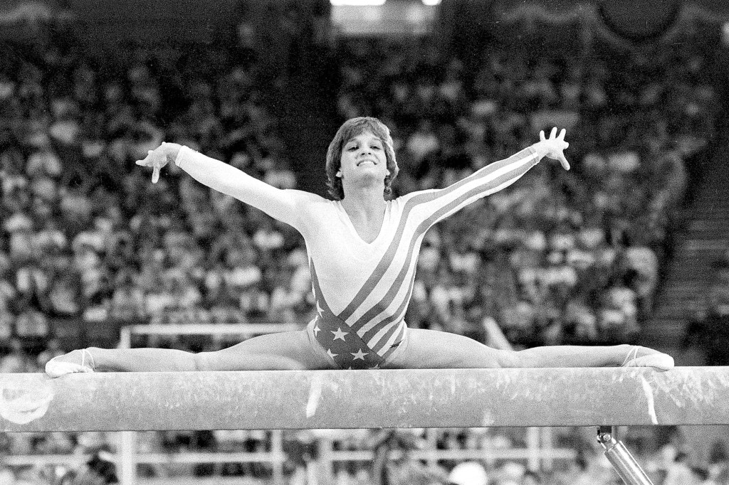 Mary Lou Retton, of the United States, performs on the balance beam during the women's gymnastics individual all-around finals at the Summer Olympics on Aug. 3, 1984, in Los Angeles. 