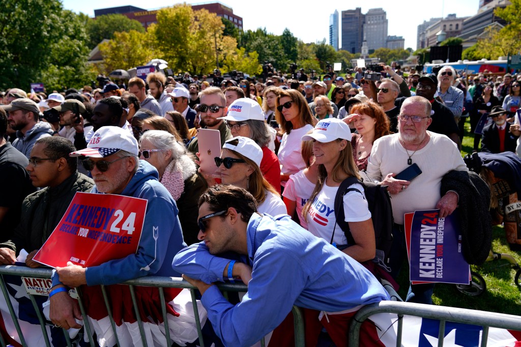 Supporters listen as Presidential candidate Robert F. Kennedy, Jr. speaks during a campaign event at Independence Mall