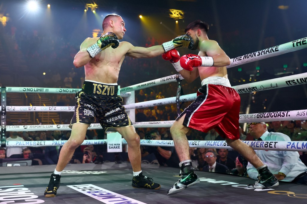 Tim Tszyu (L.) punches Carlos Ocampo during his last bout on June 18, 2023. 