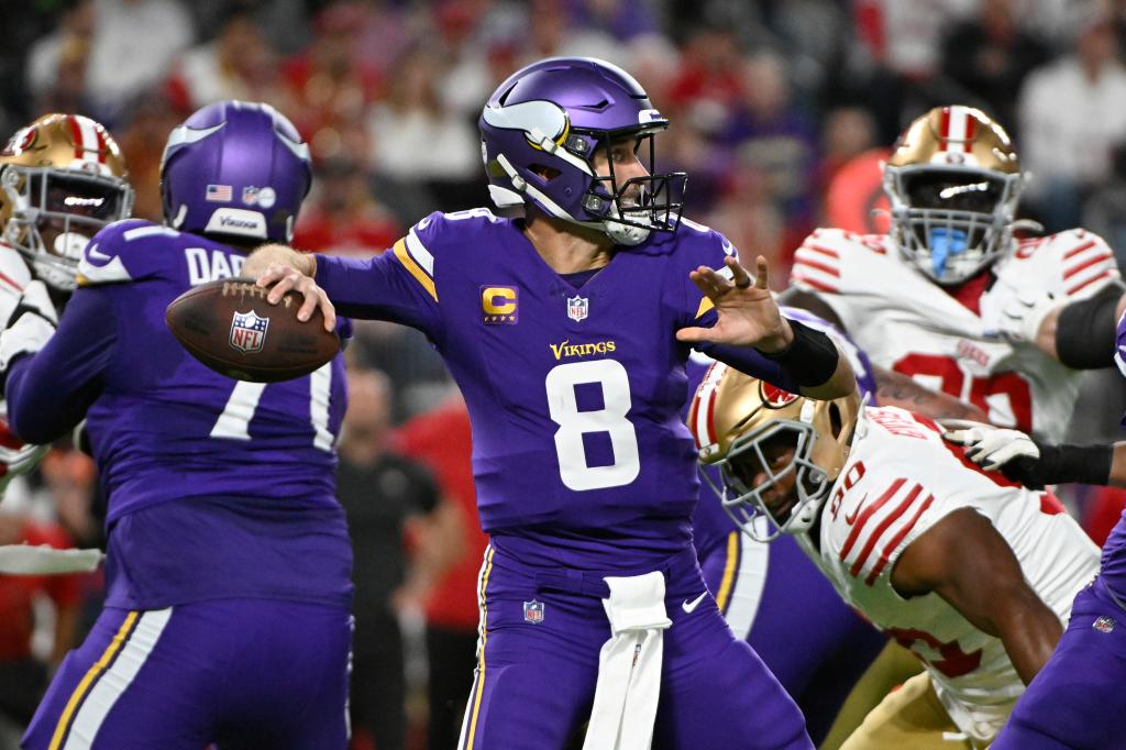 Kirk Cousins #8 of the Minnesota Vikings throws a first half pass against the San Francisco 49ers at U.S. Bank Stadium on October 23, 2023 in Minneapolis, Minnesota. 