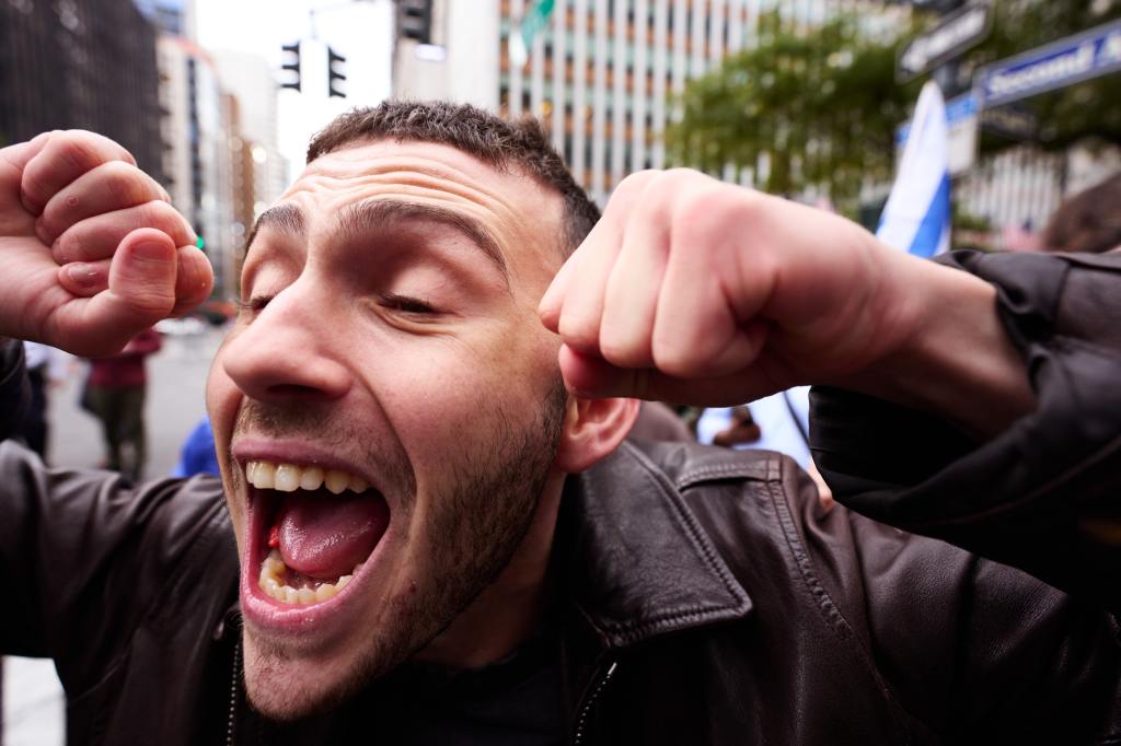 A demonstrator among the crowd at a rally in midtown Manhattan on Sunday.