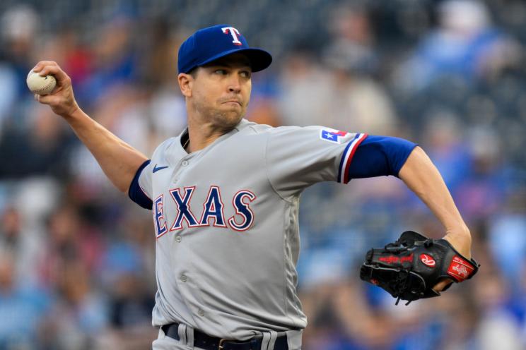 Texas Rangers starting pitcher Jacob deGrom throws to a Kansas City Royals batter during the first inning of a baseball game, Monday, April 17, 2023, in Kansas City, Mo.