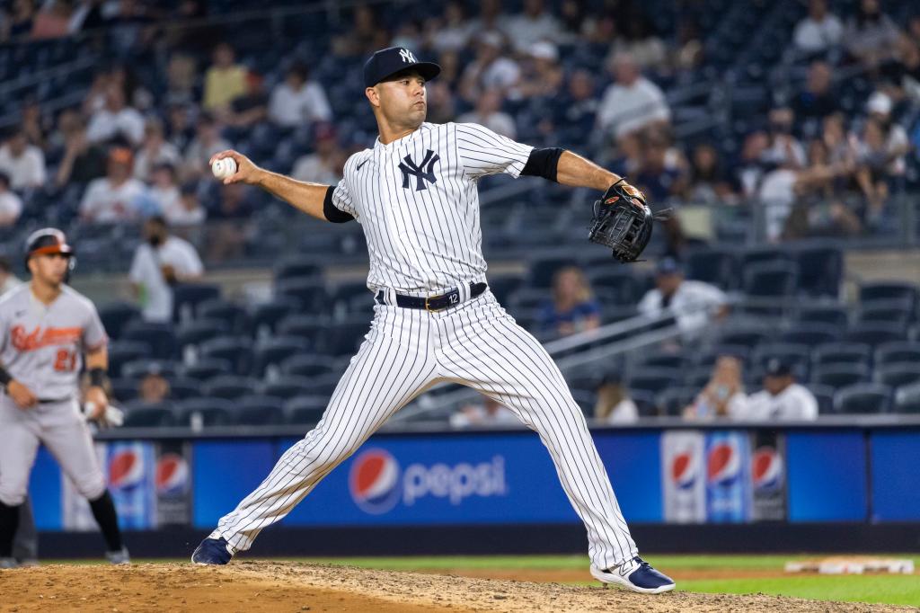 Isiah Kiner-Falefa #12 of the New York Yankees throws a pitch.