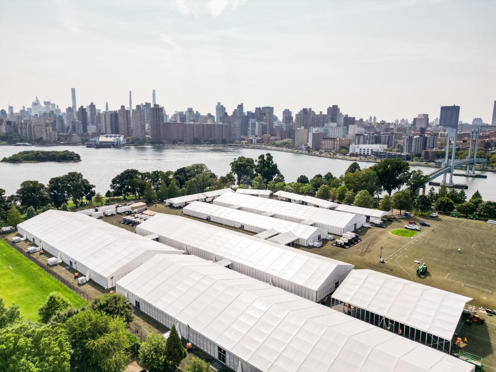 The state has also paid to set up shelters — like this one on Randall's Island — that can house asylym seekers. 