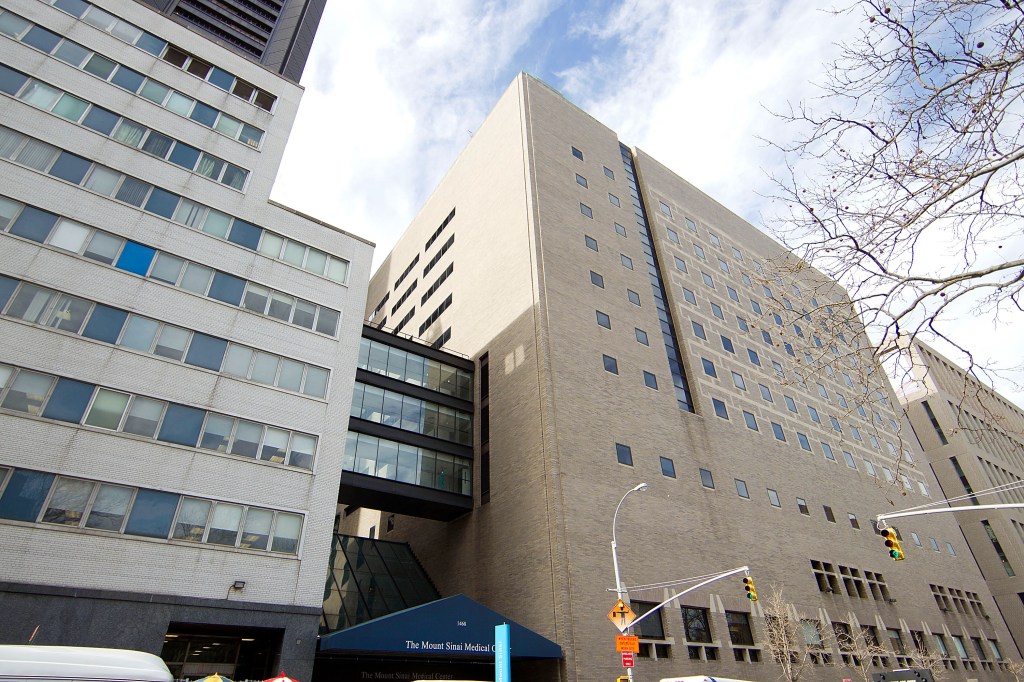 Police are seen mobilizing outside the Mt. Sinai Hospital on 59 St. in Manhattan, Monday, October 9, 2023, where a prisoner escaped from custody. 