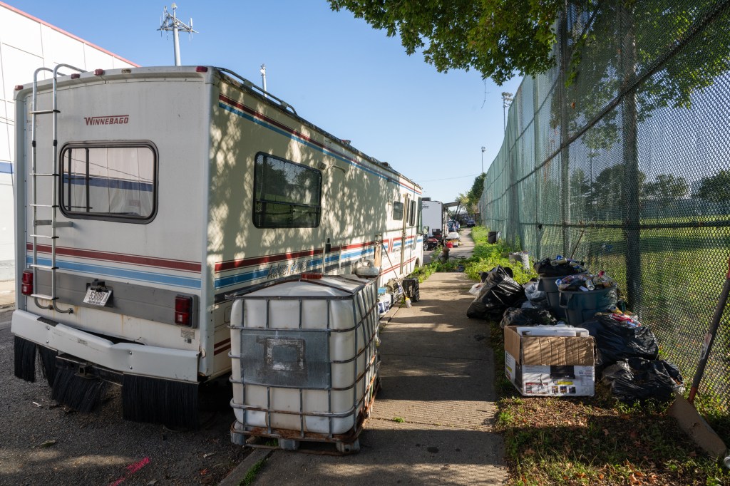 RVs and a generator, trash