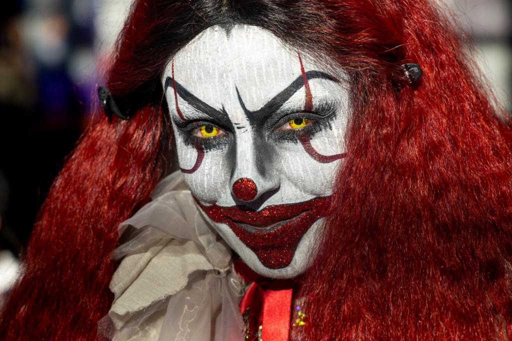 portrait of a woman dressed as a demon clown