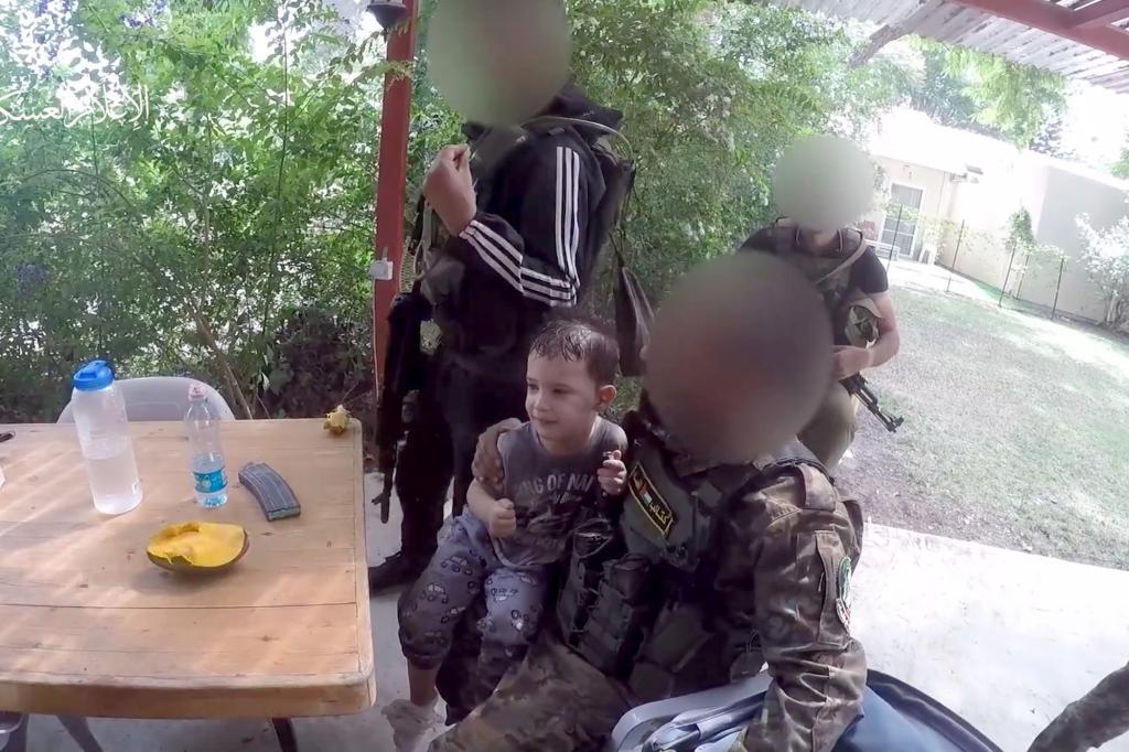 A newly released Hamas video shows two kidnapped Israeli children interacting with their captors.