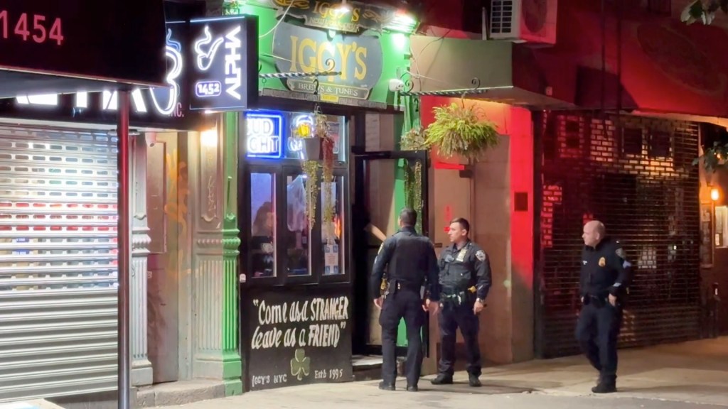 Police seen outside Iggy's bar on 2nd Avenue