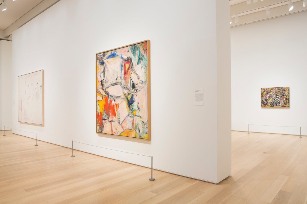 William de Kooning’s “Interchange” (right) and Jackson Pollock’s “Number 17A” (left) on display.