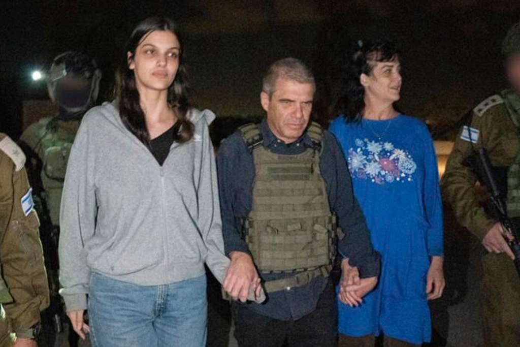 American hostages Judith Raanan and her daughter Natalie being escorted by Israeli soldiers after being released by Hamas on October 20, 2023.