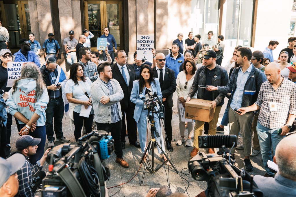 Councilwoman Inna Vernikov  holding a press conference