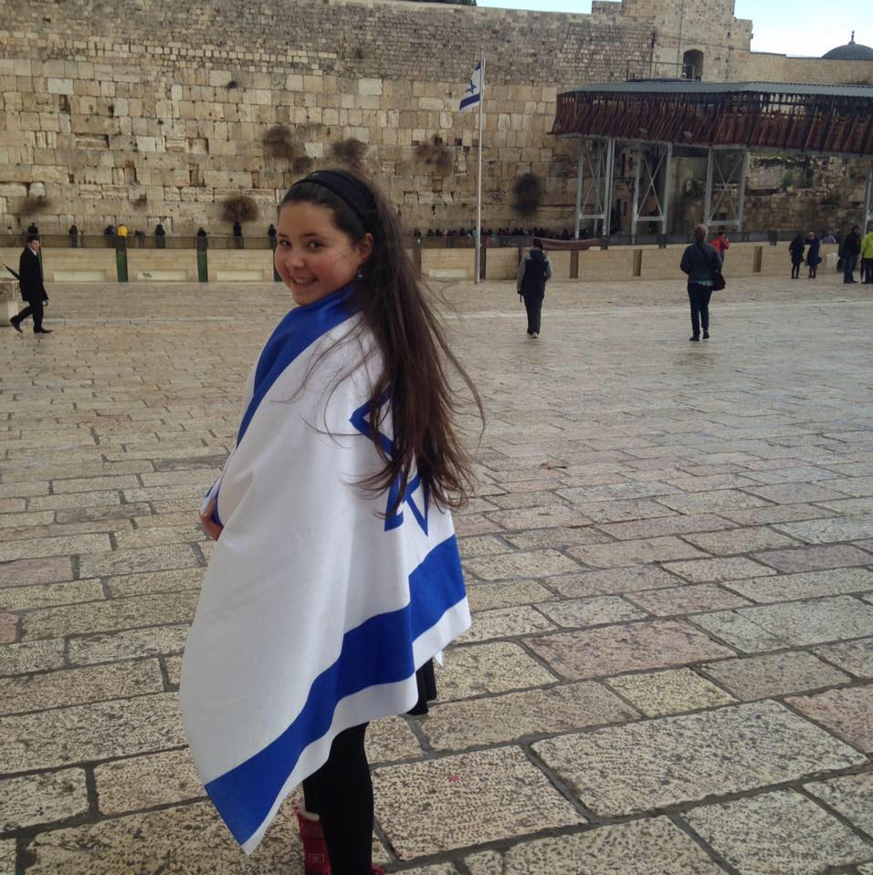 Taylor Roslyn Lent draped in an Israeli flag