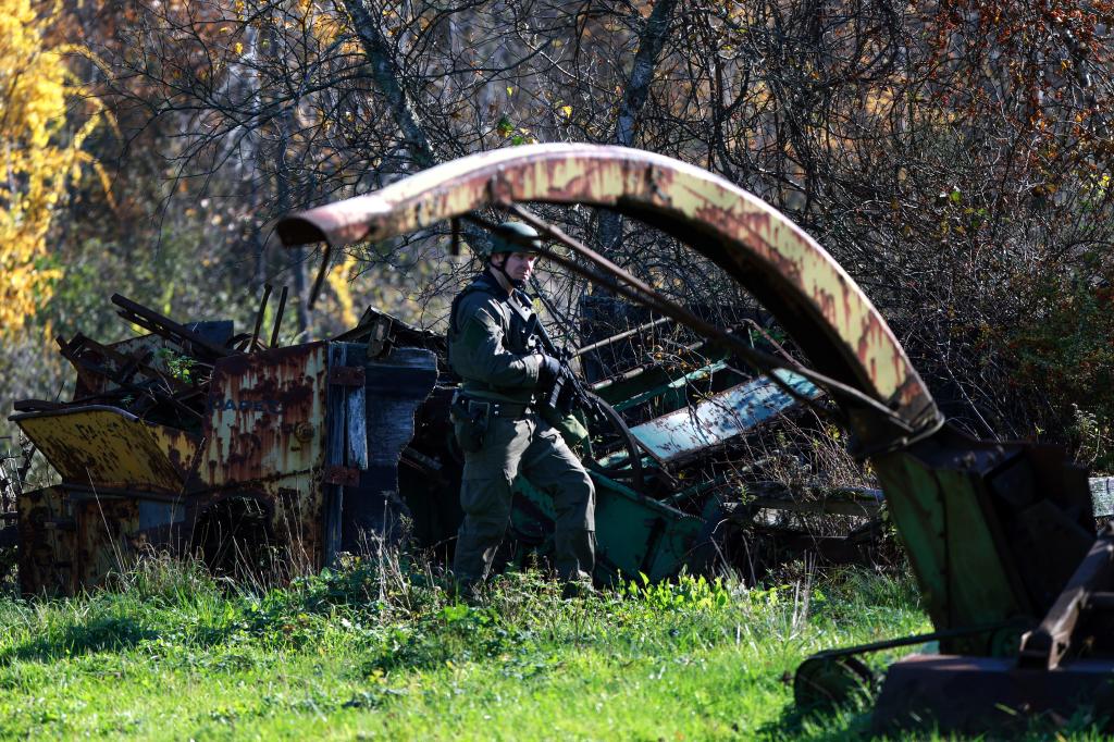 MONMOUTH, MAINE - OCTOBER 27: Law enforcement officials conduct a manhunt for suspect Robert Card following a mass shooting on October 27, 2023 in Monmouth, Maine. Police are actively searching for a suspect, Army reservist Robert Card, who allegedly killed 18 people in a mass shooting at a bowling alley and restaurant in Lewiston, Maine. (Photo by Joe Raedle/Getty Images)