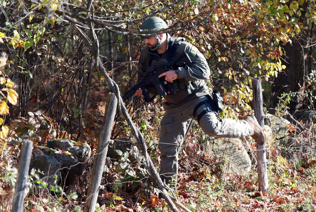 MONMOUTH, MAINE - OCTOBER 27: Law enforcement officials conduct a manhunt for suspect Robert Card following a mass shooting on October 27, 2023 in Monmouth, Maine. Police are actively searching for a suspect, Army reservist Robert Card, who allegedly killed 18 people in a mass shooting at a bowling alley and restaurant in Lewiston, Maine. (Photo by Joe Raedle/Getty Images)
