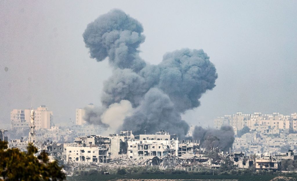 Smoke rising form buildings in the Gaza Strip after an Israeli air strike on October 28, 2023.