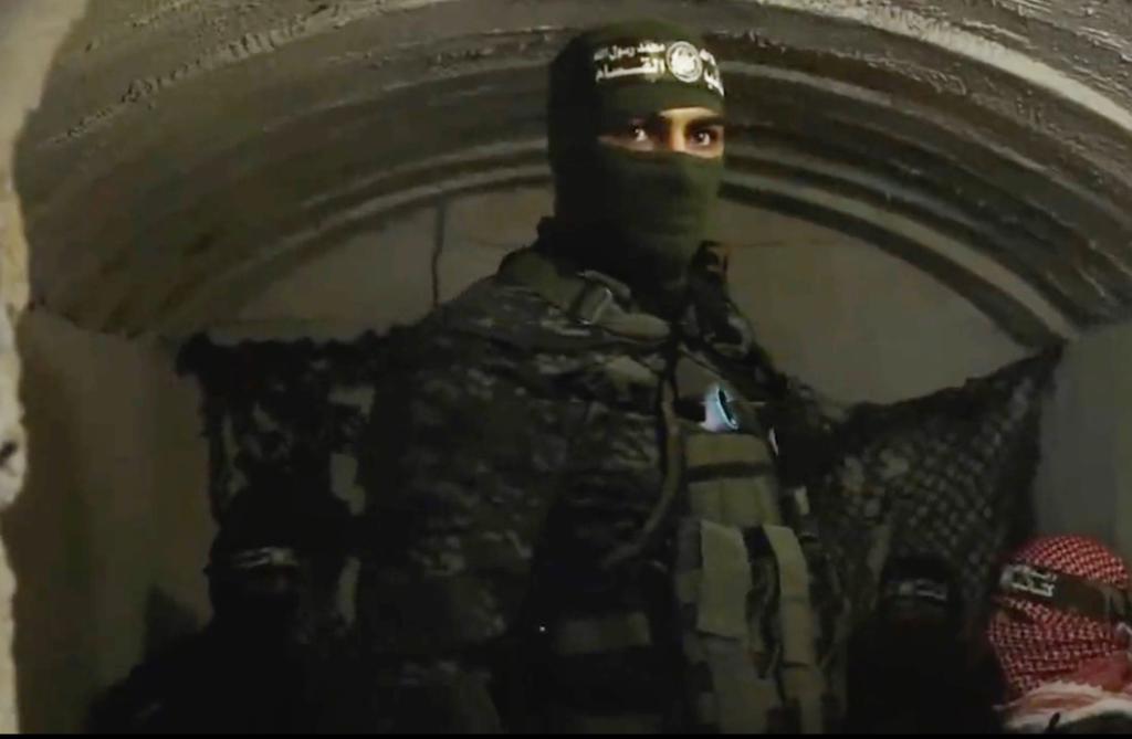 A Hamas fighter standing inside one of the tunnel rooms in an undated photo. 