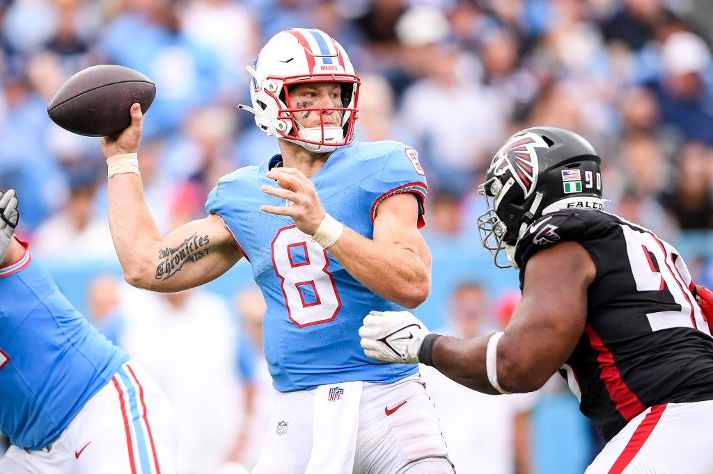 Titans quarterback Will Levis (8) throws a pass just before getting hit by Atlanta Falcons defensive tackle David Onyemata