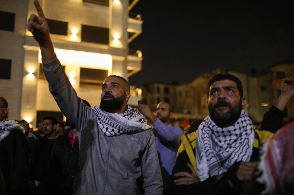 Jordanians gather during a protest in support of Palestinians in Gaza, amid the ongoing conflict between Israel and the Palestinian Islamist group Hamas