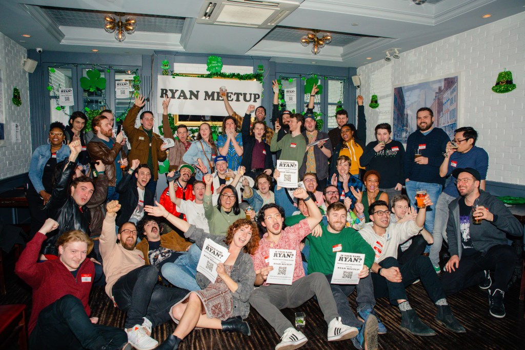 A Ryan meetup indoors with St. Patrick's Day decorations. 