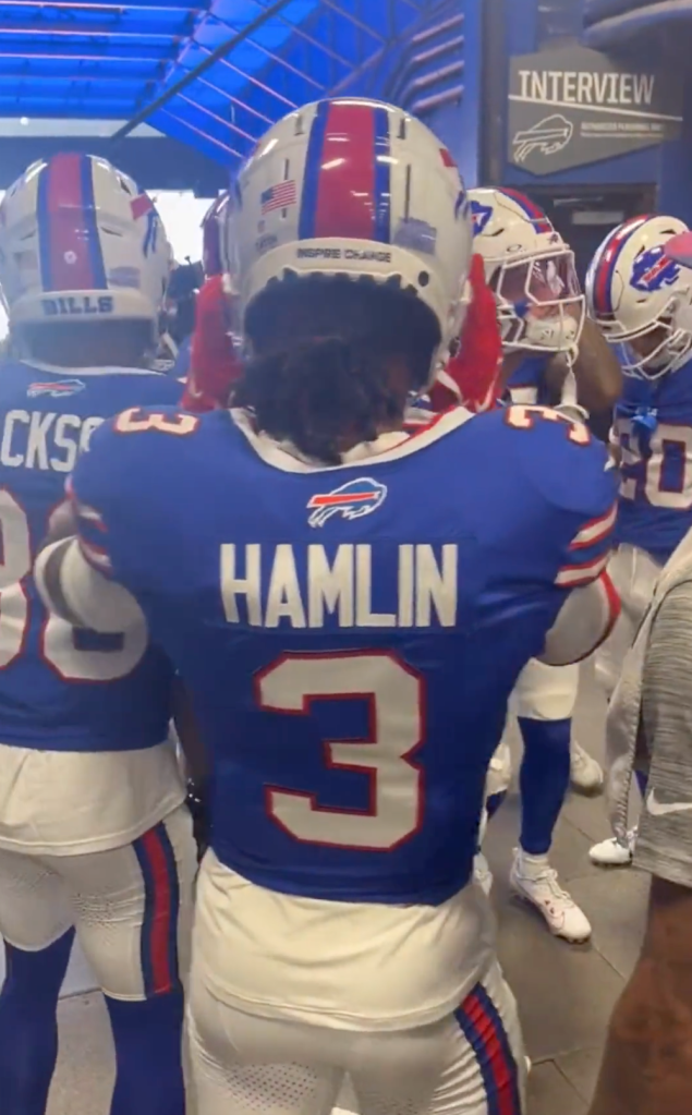 Damar Hamlin joins his teammates in the pregame huddle. 