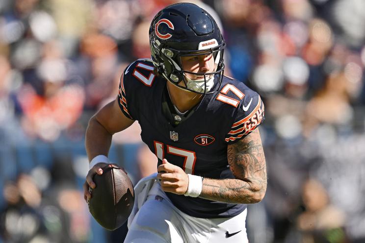 Tyson Bagent #17 of the Chicago Bears runs with the ball during the second quarter against the Las Vegas Raiders at Soldier Field on October 22, 2023 in Chicago, Illinois.