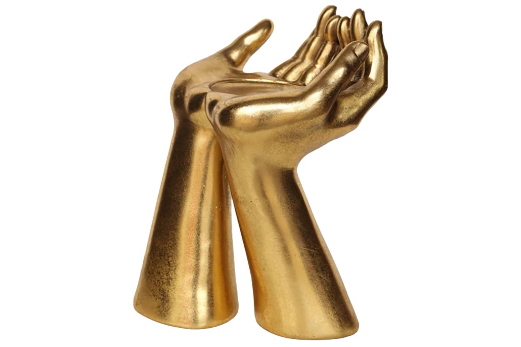 Gold hands candle holder