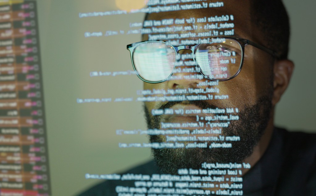 man studying a see through display 