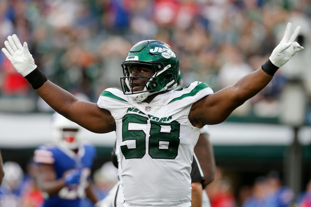 Carl Lawson #58 of the New York Jets in action against the Buffalo Bills at MetLife Stadium on November 06, 2022 in East Rutherford, New Jersey. The Jets defeated the Bills 20-17.