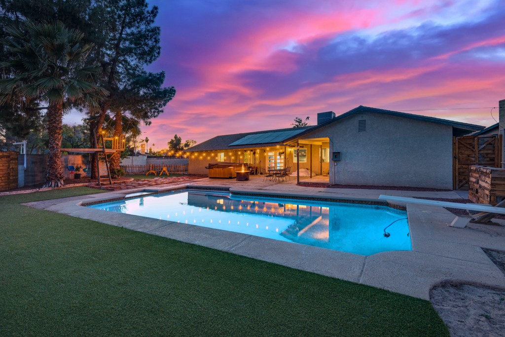 The pool and backyard space. 