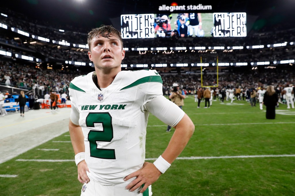 Quarterback Zach Wilson #2 of the New York Jets walks off the field after the Las Vegas Raiders defeated the Jets to win the game at Allegiant Stadium 