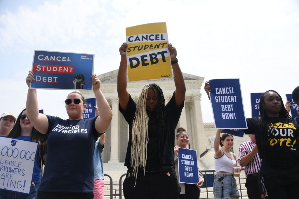 Supporters of student debt forgiveness demonstrate outside the US Supreme Court on June 30, 2023.