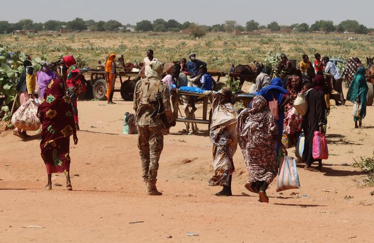 Families escaping Ardamata in West Darfur cross into Adre, Chad, after a wave of violence on November 7, 2023.