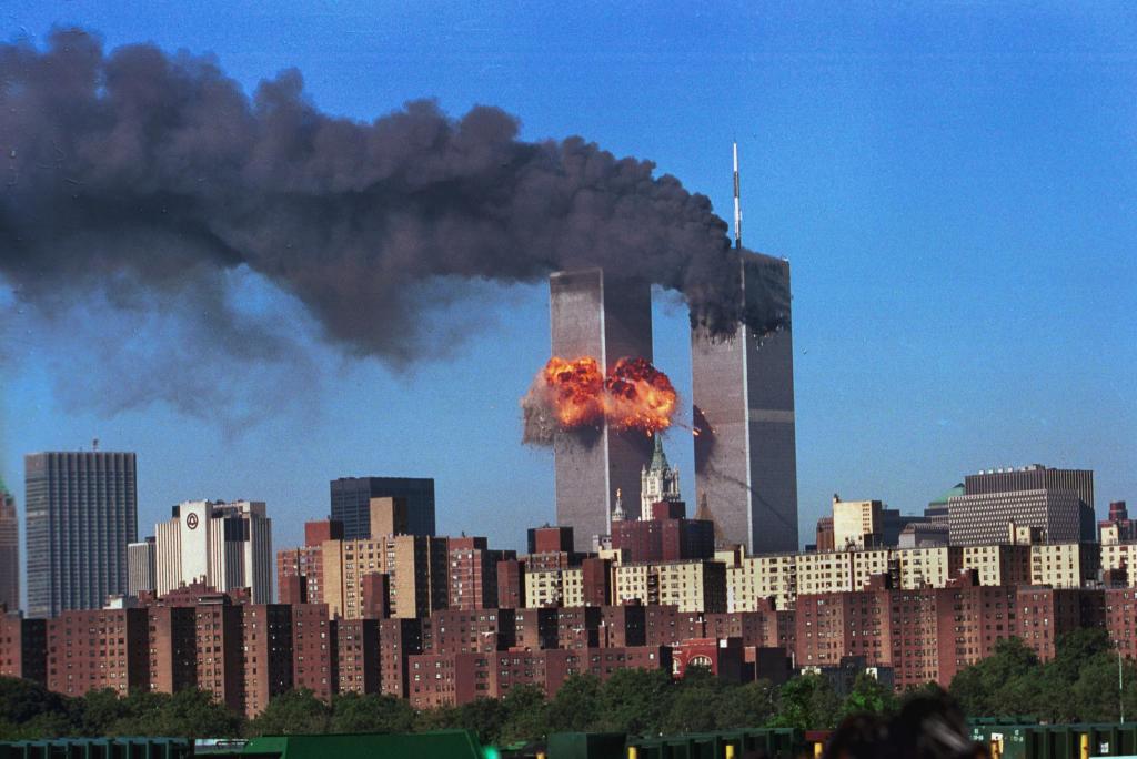 Nearly 3,000 Americans died in the terrorist attacks of Sept. 11, 2001. The image above shows a hijacked airliner flying into the World Trade Center.