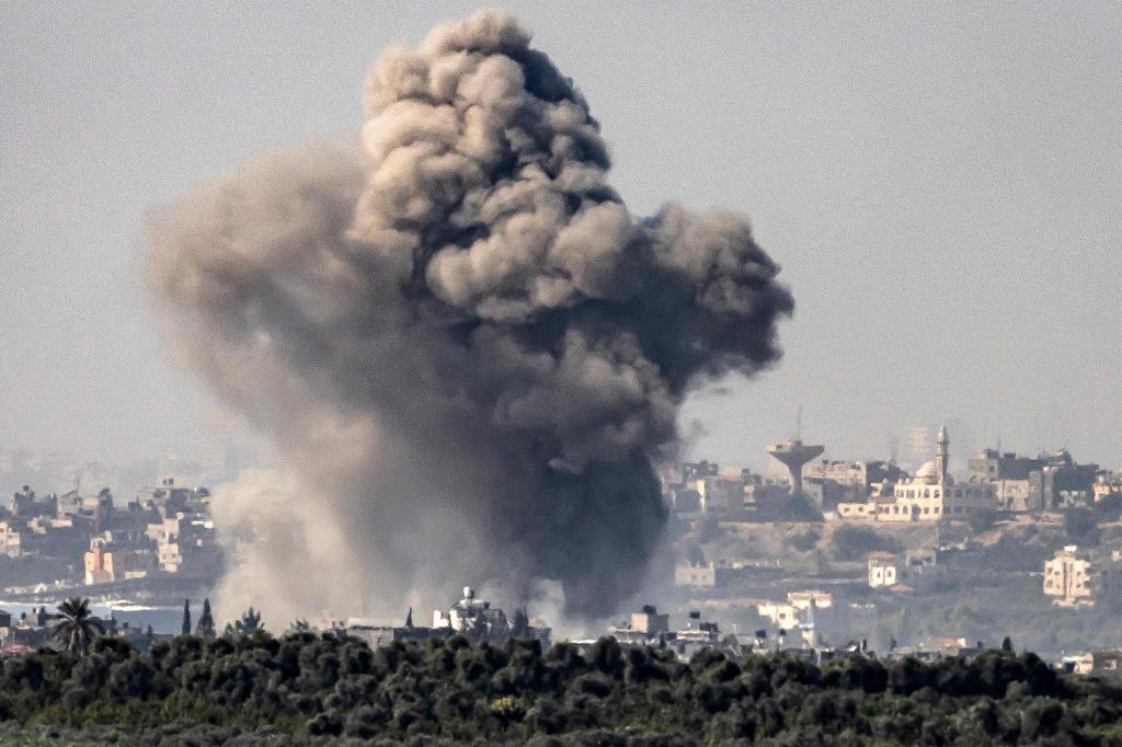 This picture taken on November 3, 2023 from a position along the border with the Gaza Strip in southern Israel shows a smoke plume erupting during Israeli bombardment amid ongoing battles between Israel and the Palestinian Hamas movement.