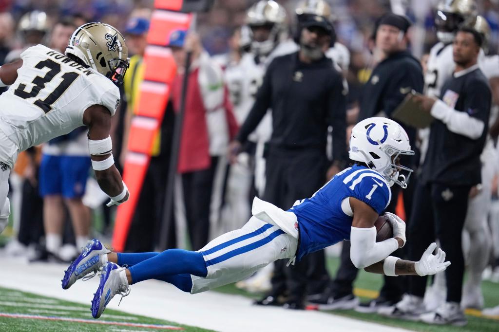 Colts receiver Josh Downs hauls in a pass against the Saints on Oct. 29, 2023.