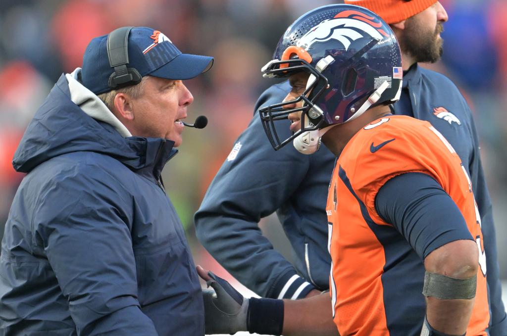 Denver Broncos Head coach Sean Payton, left, and Denver Broncos quarterback Russell Wilson (3) talks during the second half at Empower Field at Mile High on October 29, 2023 in Denver, Colorado. The Denver Broncos beat the Kansas City Chiefs 24 to 9 during week 8 of the NFL regular season. 