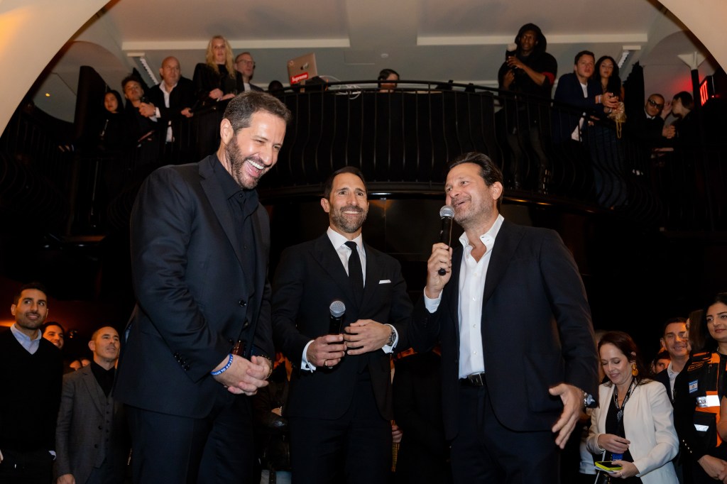 Actor Modi (left) joins restaurateurs Cobi Levy (center) and Jason Pomeranc to raise money for United Hatzalah Emergency Relief Fund at Al Coro on Nov. 1.