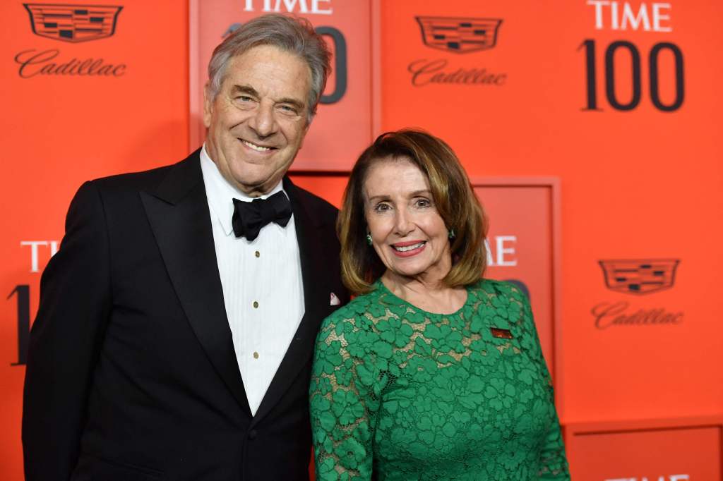 (FILES) In this file photo taken on April 23, 2019, US Speaker of the House of Representatives Nancy Pelosi (R) and husband Paul Pelosi arrive for the Time 100 Gala at Lincoln Center in New York.