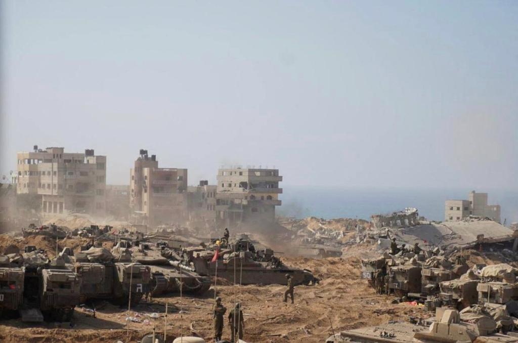 Israeli soldiers and tanks take position inside the Gaza Strip, according to the Israeli Defense Forces (IDF)