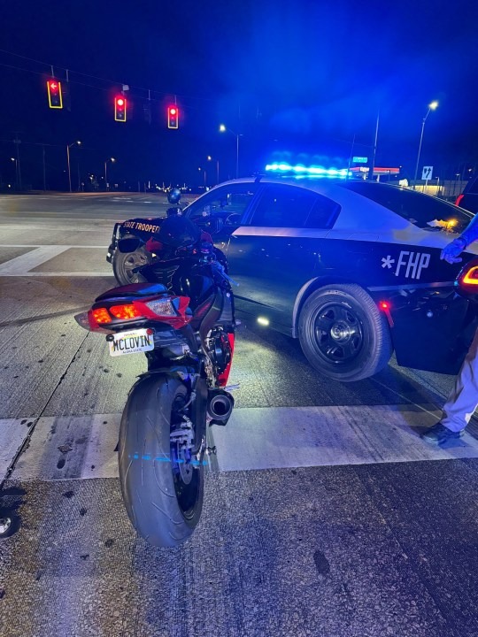 Rivera's motorcycle had a fake "MCLOVIN" license plate.