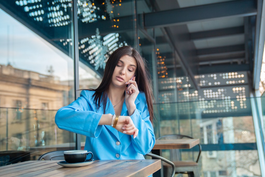 Woman looking at watch