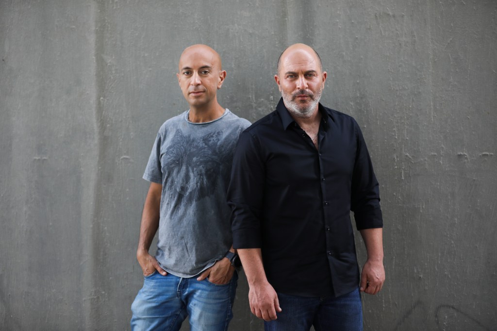 Issacharoff (left) and "Fauda" co-creator Lior Raz 