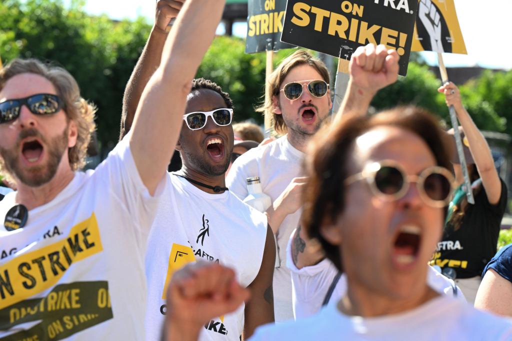 SAG-AFTRA members and supporters picket outside Paramount Studios during their strike against the Hollywood studios, in Los Angeles, California, on November 8, 2023