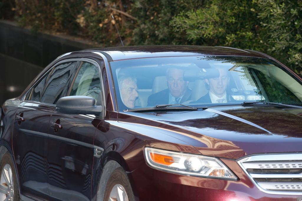 Paul Pelosi in a car with two other men