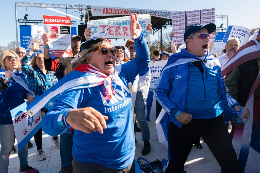 Fervent marchers shout their support for Israel.